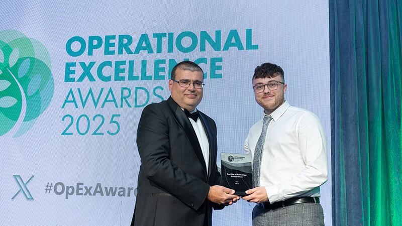 Alessandro Laureani, awards judge, presents the best use of technology in operations award to Ian Lambe, IRLCA