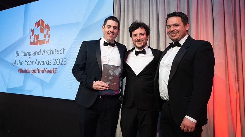 Alex Lynam, community lead, BusinessRiver, presents the housing project of the year (refurbishment) award to Ronan Fitzpatrick and Peter McGonigle, Craftstudio Architecture