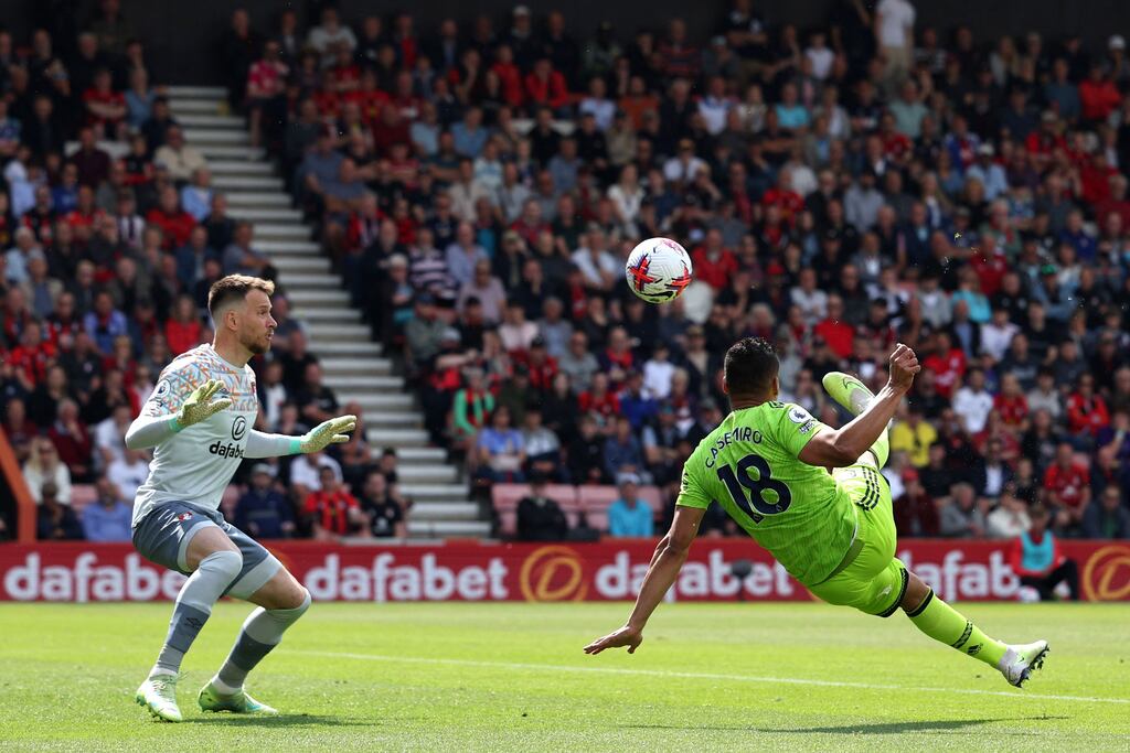 Manchester United's Brazilian midfielder Casemiro (R) scores the opening goal past Bournemouth's Brazilian goalkeeper Neto. Photograph: Adrian Dennis/AFP via Getty
