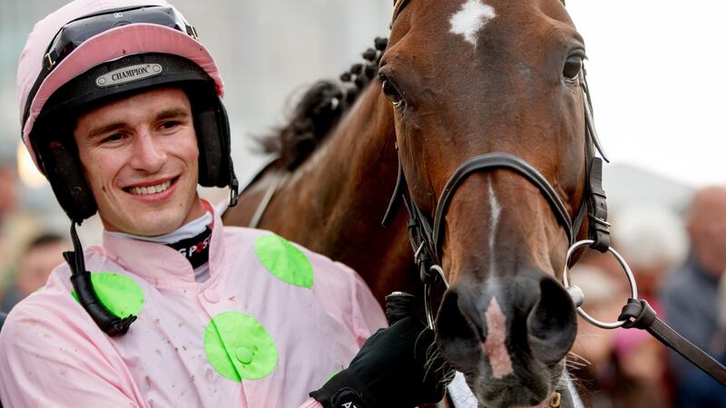 Jackey Danny Mullins celebrates after Riven Light’s  win in the Colm Quinn BMW Mile Handicap on day two of the Galway Racing Festival at Ballybrit. Photograph: James Crombie/Inpho