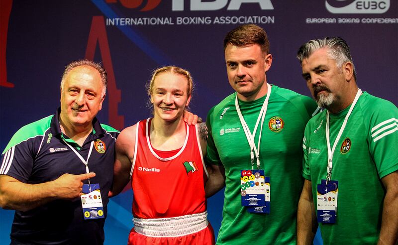 Amy Broadhurst with coaches Zauri Antia, Eoin Pluck and John Conlan during the 2022 Women's European Championships in Montenegro in 2022. Photograph: Aleksandar Djorovic/Inpho