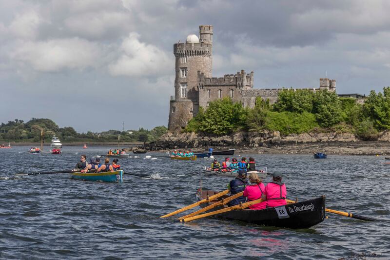 An Rás Mór, the Cork Harbour Festival’s flagship event passing Blackrock Castle, celebrates its 20th anniversary, which went ahead despite adverse wind conditions. Photograph: Clare Keogh