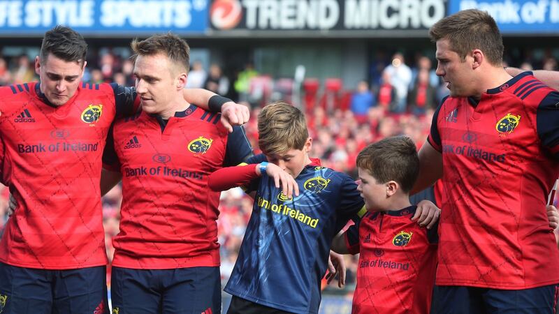 Anthony Foley’s sons Tony and Dan with Munster players after the European Champions Cup  match against Glasgow Warriors at  Thomond Park on October 22nd. Photograph:  Lorraine O’Sullivan/PA Wire