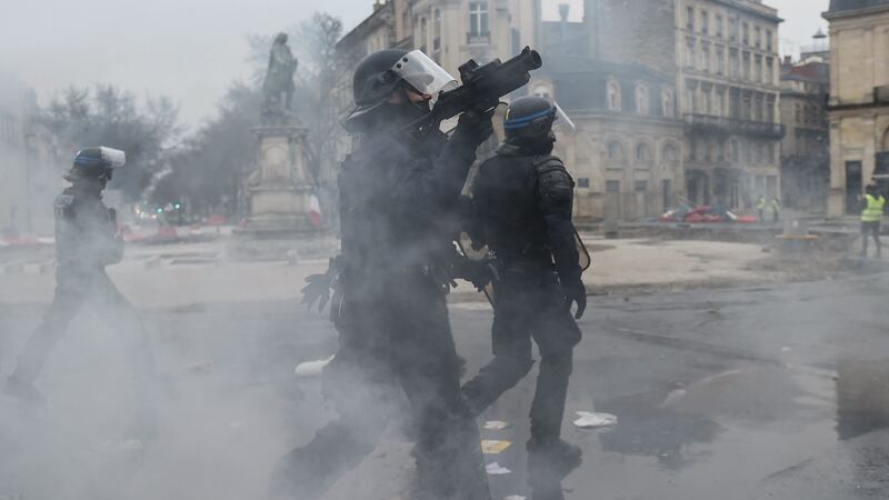 French riot police advance during protests by “yellow vest” (gilets jaunes) anti-government demonstrators in the western French city of Bordeaux on Saturday. Photograph: Mehdi Fedouach/AFP/Getty Images