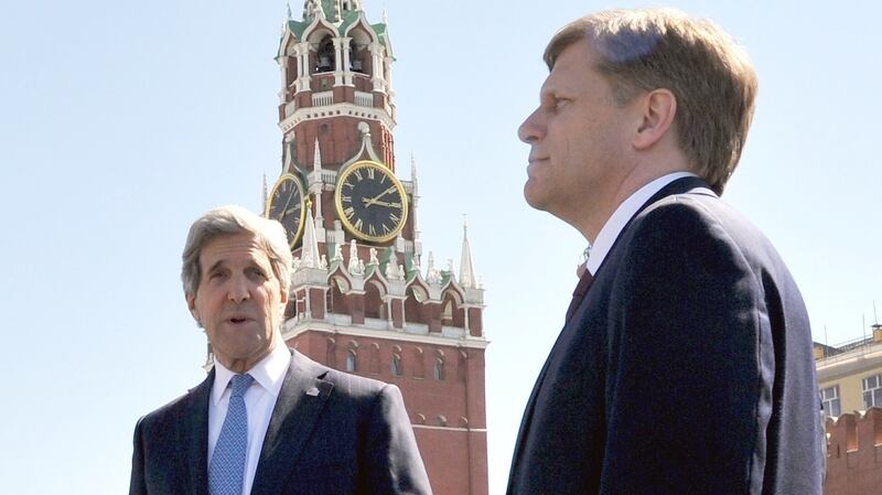 US secretary of state John Kerry and US ambassador to Russia Michael McFaul in Red Square, Moscow, May 2013. Photograph: Mladen Antonov/AFP/Getty Images