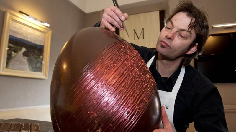 Chocolatier Benoit Lorge at work on a giant Easter egg. Photograph: Andrew Downes