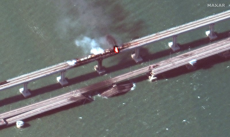 A satellite image provided by Maxar Technologies shows the aftermath of the large explosion that heavily damaged the strategic Kerch bridge. Photograph: Maxar Technologies via New York Times