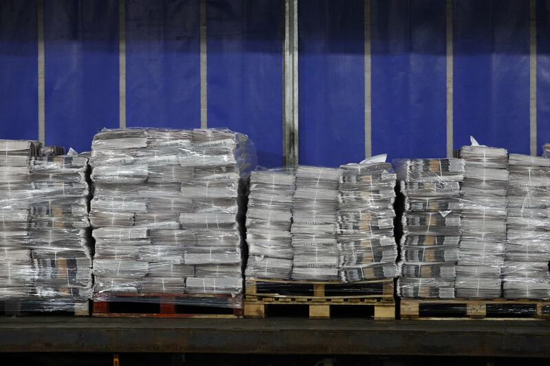 Pallets of newspapers ready for the road.  Photograph: Nick Bradshaw