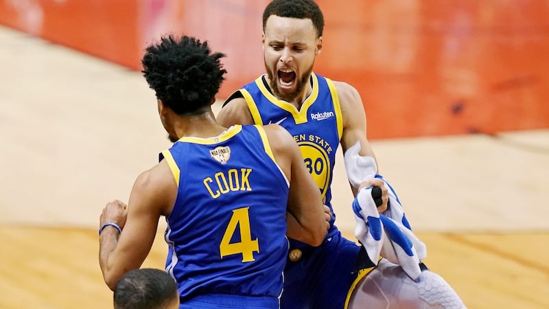 Golden State Warriors guard Stephen Curry celebrates with his team-mate Quinn Cook   during a time-out in the fourth quarter against the Toronto Raptors in game two of the 2019 NBA Finals at Scotiabank Arena. Photograph: Kyle Terada/USA Today Sports