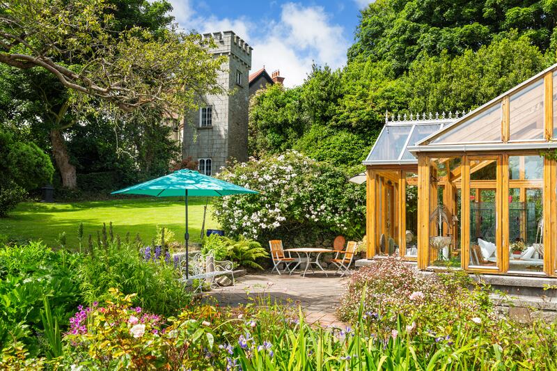 Sunroom, gardens and Spite Tower