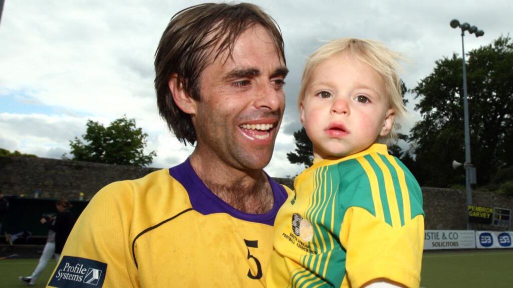 New Ireland coach Craig Fulton, seen here with his son after winning the 2010 Men’s Irish Hockey League with Pemboke.Photograph: Dan Sheridan/Inpho