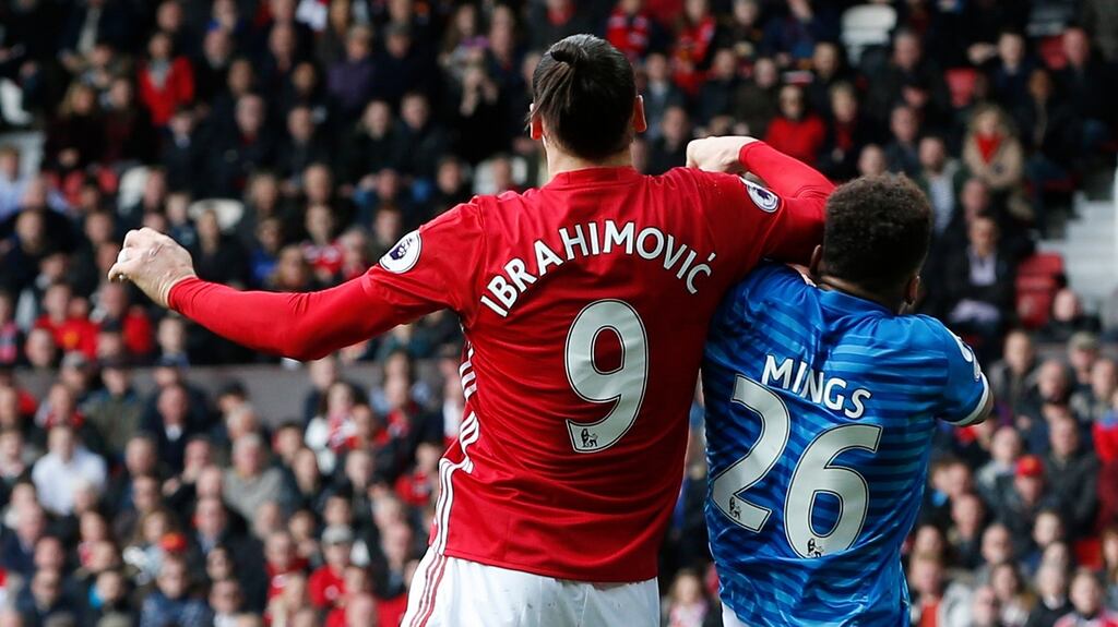 Bournemouth’s Tyrone Mings is challenged by Manchester United’s Zlatan Ibrahimovic during their Premier League draw at Old Trafford. Photo: Getty Images