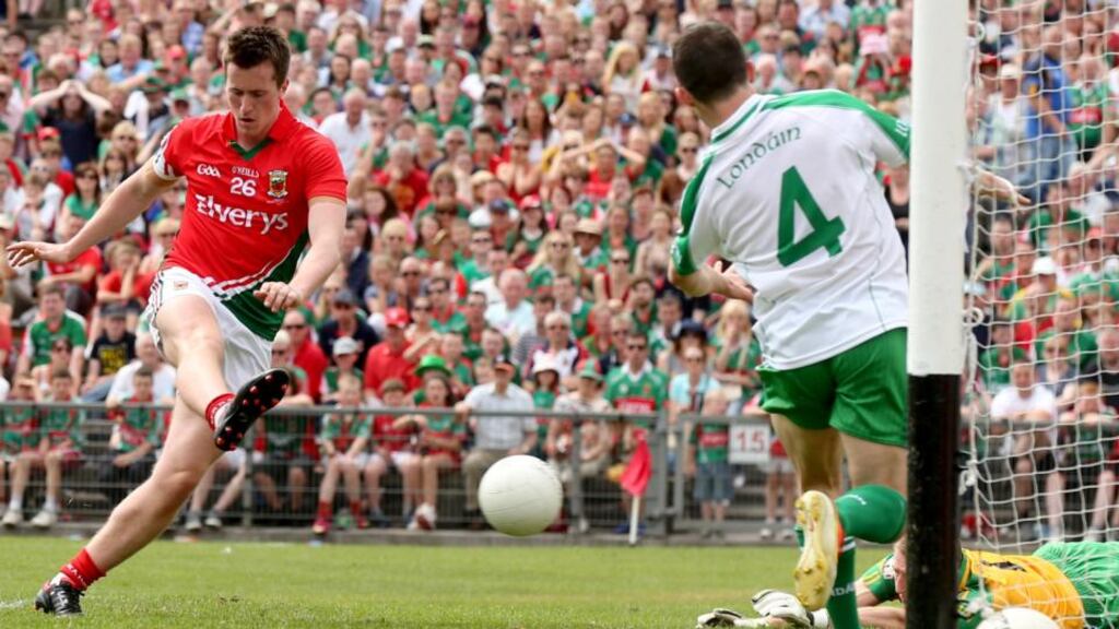Mayo’s Cillian O’Connor scores one of his side’s five goals against London. Photgraph: James Crombie/Inpho