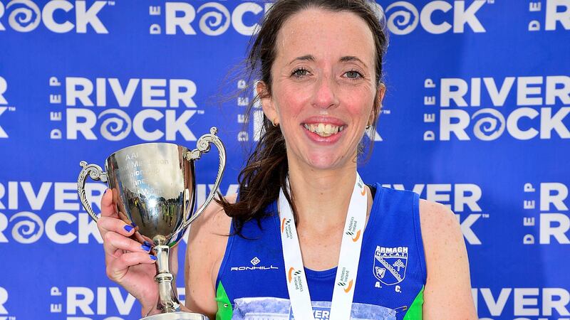 Fionnuala Ross celebrates her victory in the Belfas at City Marathon. Photograph:  Arthur Allison/ Pacemaker Press