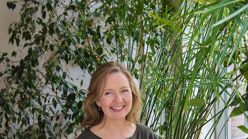 Lucy Downes  with her favourite plants at her studio at Lansdowne Park, Dublin. Photograph: Brenda Fitzsimons.