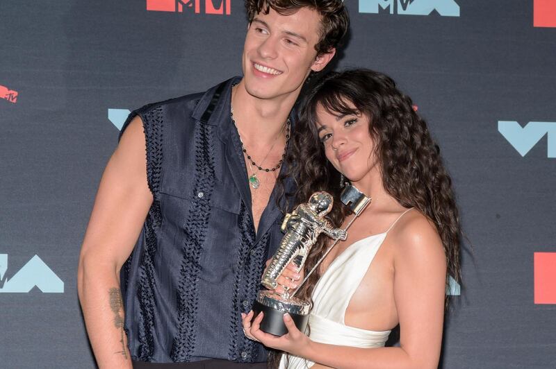 Shawn Mendes and  Camila Cabello pose with the Best Collaboration Award in the press room at the awards. Photograph:  DJ Johnson/EPA