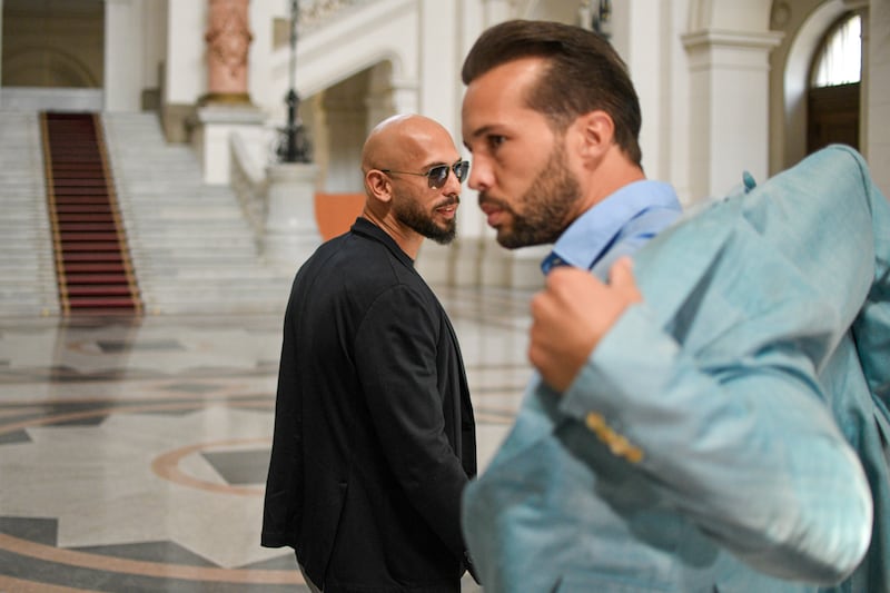 Andrew Tate (left) and his brother Tristan at a court in Bucharest. Photograph: Alexandru Dobre/AP