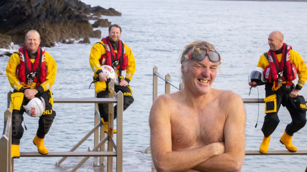 Michael Power (55) and his RNLI rescuers. Photograph: Patrick Browne