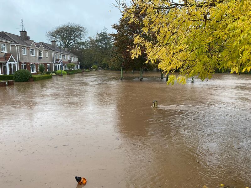 Flood levels of the Owenacurra River adjoining Woodlands Estate, Midleton, were being closely monitored on Friday. Photograph: Cork County Council
