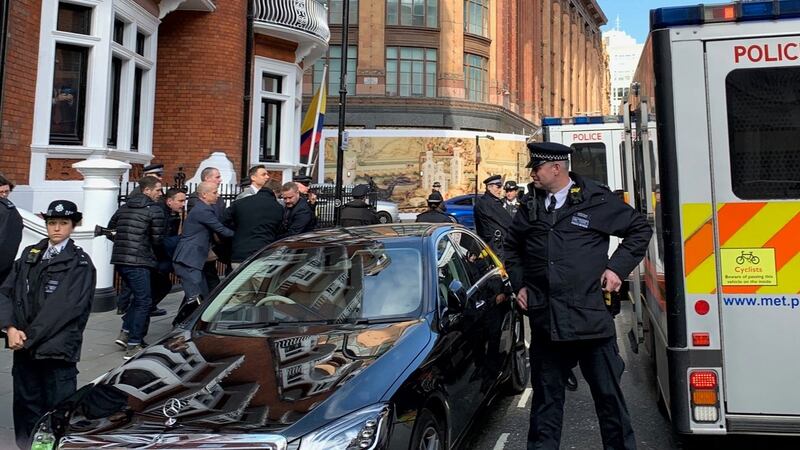 Police carry Julian Assange from the Ecuadorian embassy in London after he was arrested by police officers  and taken into custody following the Ecuadorian government’s withdrawal of asylum. Photograph: PA