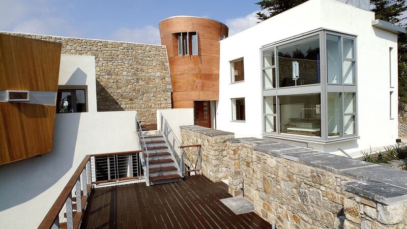Eddie Irvine’s house in Dalkey was designed to use local granite and natural materials.