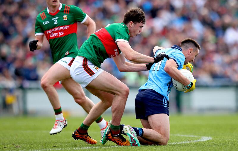 Dublin’s Cormac Costello and Sam Callinan of Mayo. Photograph: Ryan Byrne/Inpho