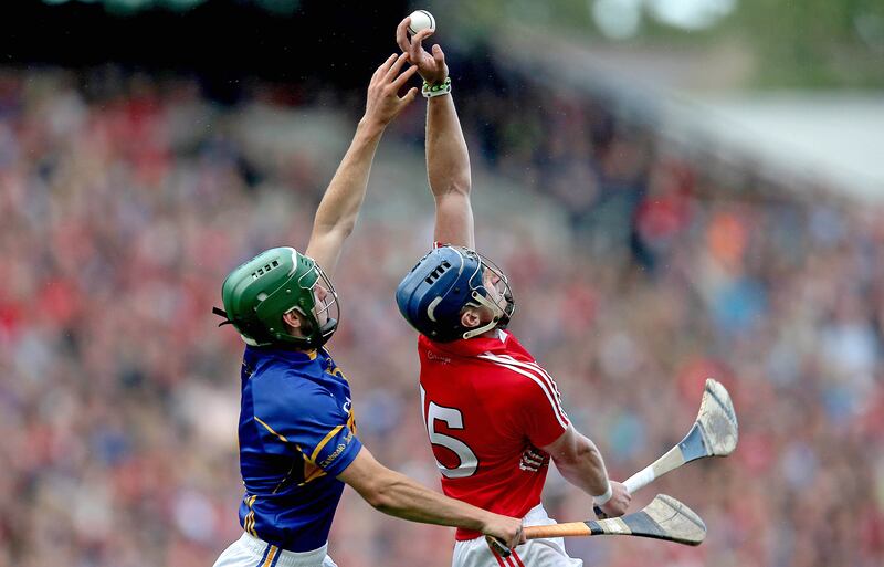 Patrick Horgan beats Tipperary's Cathal Barrett in the air during the 2014 All-Ireland semi-final. Photograph: Donall Farmer/Inpho