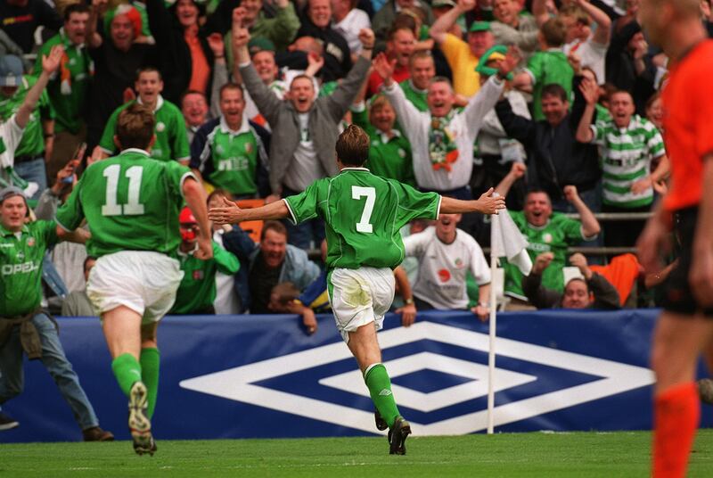 Jason McAteer runs towards the celebrating fans after his goal for the Republic of Ireland against the Netherlands during the World Cup qualifier at Lansdowne Road in September, 2001. Photograph: Lorraine O'Sullivan/Inpho