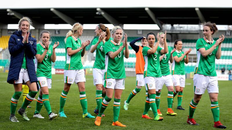 The Ireland players acknowledge the crowd after the game. Photograph: Ryan Byrne/Inpho