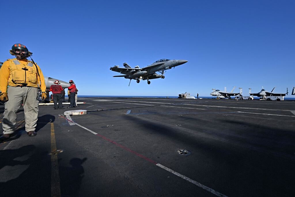 An F/A-18 Hornet fighter jet landing on the USS Harry S Truman during a Nato exercise in May 2022. Photograph: ANDREAS SOLARO/AFP via Getty Images