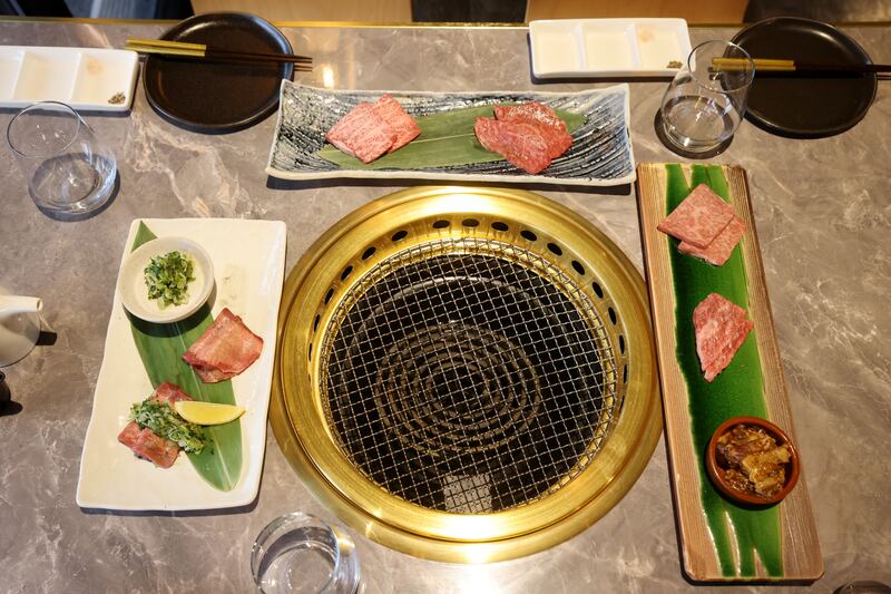 Yakiniku Matsukawa: The grills sit within polished brass rings. Photograph: Alan Betson