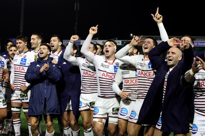 Bordeaux-Begles' players celebrate their victory. Photograph: Paul Faith/AFP via Getty Images  