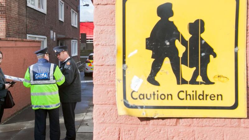 “In the drugs trade, murder begets murder, while poverty and social disadvantage provide a ready supply of young replacements.”  Gardaí  on Wednesday at the scene of the  fatal shooting of Jason “Buda” Molyneux (27) at James Larkin House at North Strand, Dublin. Photograph: Gareth Chaney/Collins