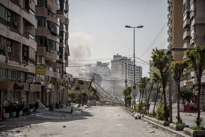 Smoke rises from the site of an airstrike in Beirut's southern suburbs. Photograph: Sally Hayden