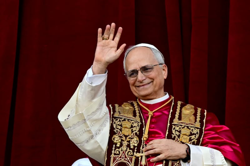 Newly elected Pope Leo XIV, Robert Prevost addresses the crowd from the main central loggia balcony of the St Peter's Basilica for the first time, after the cardinals ended the conclave, in The Vatican Photo TIZIANA FABI/AFP via Getty Images