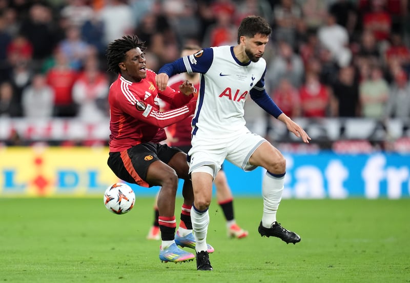 Manchester United's Patrick Dorgu (left) and Tottenham Hotspur's Rodrigo Bentancur battle for the ball. Photograph: Adam Davy/PA