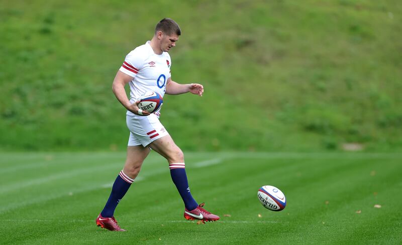 Owen Farrell, the England captain, kicks the ball during the captain's run in Bagshot, England. Photograph: David Rogers/Getty Images