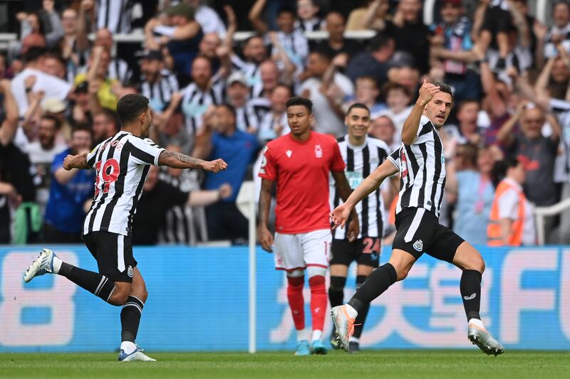 Fabian Schar of Newcastle United celebrates after scoring. Photograph: Stu Forster/Getty