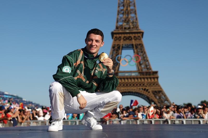 Rhys McClenaghan poses with his Olympic gold medal in Paris in August 2024. Photograph: Maja Hitij/Getty