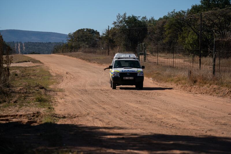 A police vehicle on the road by the Phala Phala game farm. Photograph: Joao Silva/The New York Times