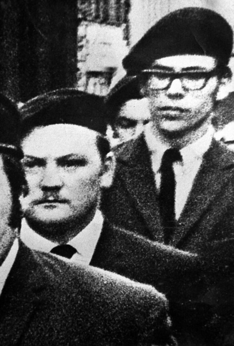 Gerry Adams (right) and Martin Meehan (centre)  in a guard of honour at the funeral of an IRA leader in 1971. Photograph:  Justin Kernoghan /  Photopress Belfast
