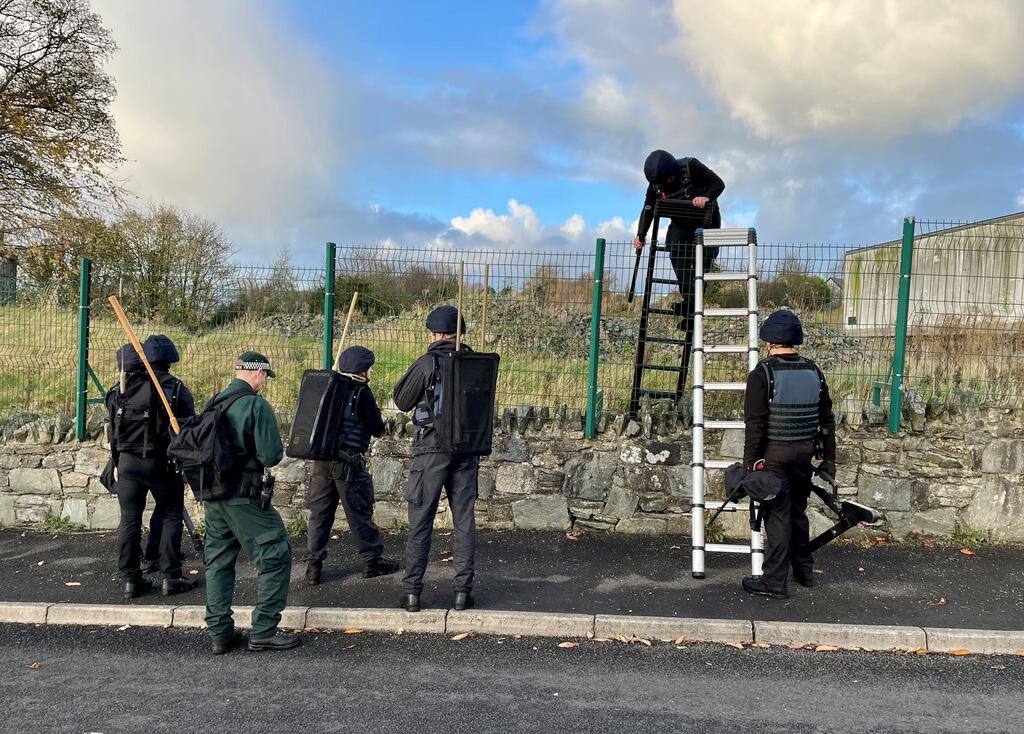 Army search teams assisted by the PSNI at the scene, following the attempted murder of two officers in Strabane. Photograph: David Young/PA