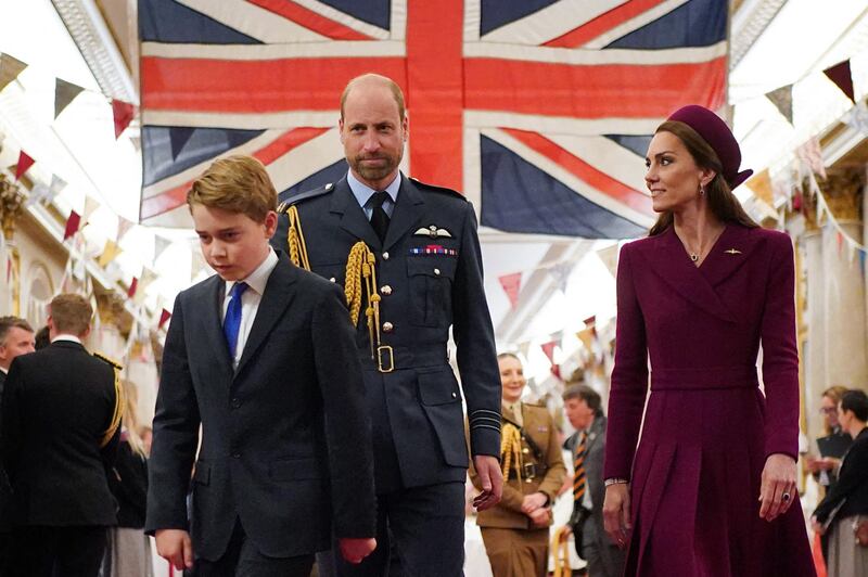 Prince William and Princess of Wales Kate Middleton with their son Prince George of Wales arrive for a tea party for second World War veterans at Buckingham Palace. Photograph: Yui Mok/Getty Images