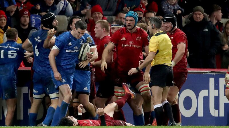 Tempers flare between Leinster’s Johnny Sexton and Munster’s Joey Carbery during a derby match. File photograph: ©INPHO/Dan Sheridan