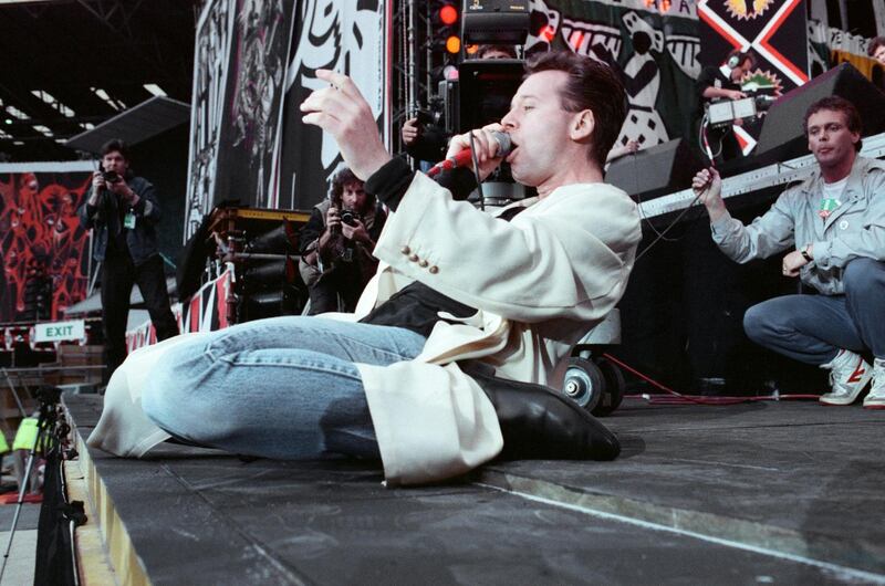 Jim Kerr onstage at the Nelson Mandela 70th Birthday Tribute concert, Wembley Stadium, 1988. Photograph: Brendan Monks/Mirrorpix/Getty Images