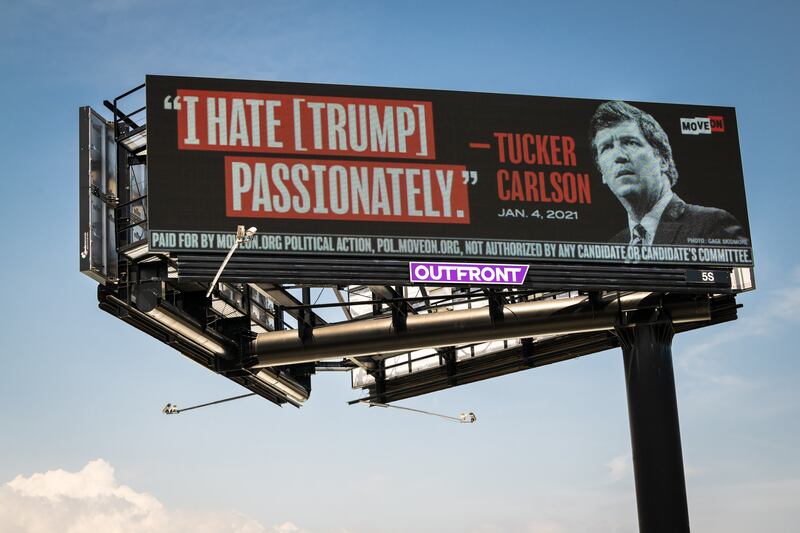 A billboard in Palm Beach on the highway approach to Mar-a-Lago, Trump's Florida residence, in April 2023. Photograph: Jason Koerner/Getty Images for MoveOn Political Action