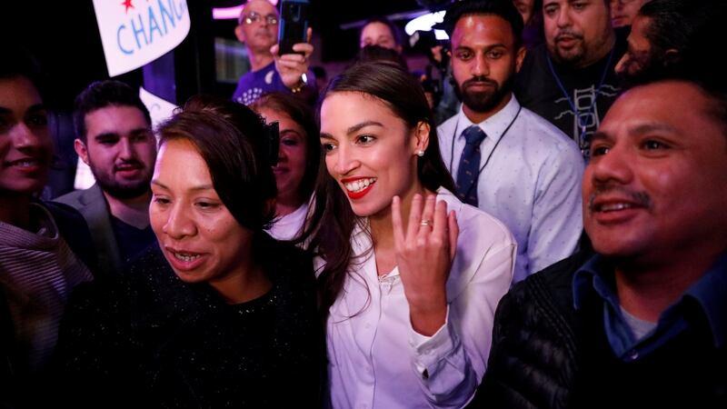 Democratic congressional candidate Alexandria Ocasio-Cortez, who secured election, greets supporters  in New York City. Photograph: REUTERS/Andrew Kelly