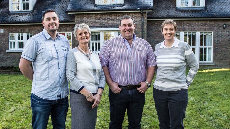 Truck driver Clive Woods, engineer Russell and Church of Ireland rector Tanya, with their mother Rosemary Woods, whom they are trying to buy a house for in the RTÉ documentary Goodbye House