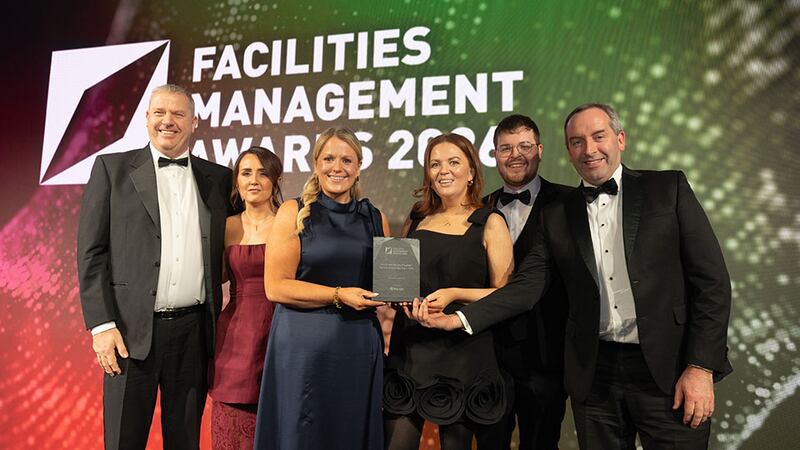 April Willoughby, head of property, construction, sales strategy and transformation, Panda, presents the client and service provider partnership of the year – TFM award to the JLL and LinkedIn Team