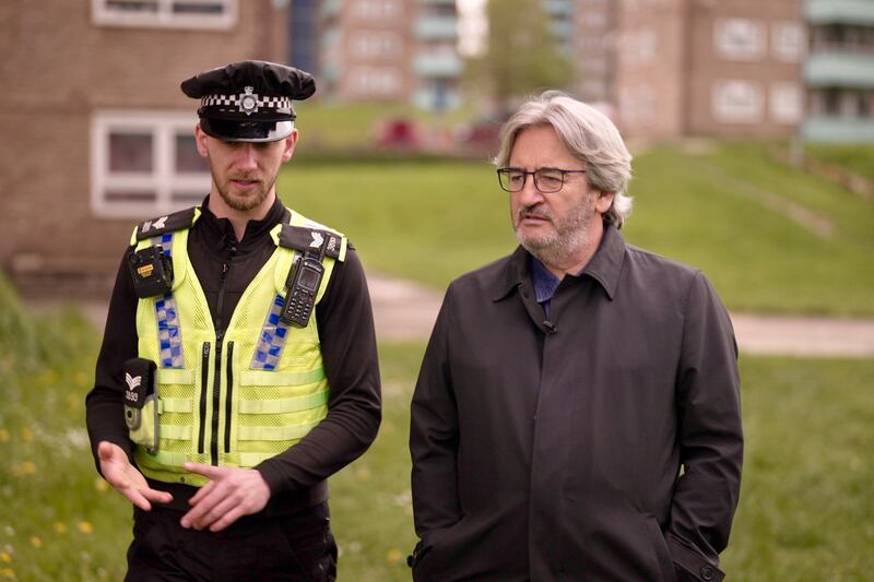 Police sergeant Jonathan Attree and Fergal Keane. Photograph: David McIlven/BBC News